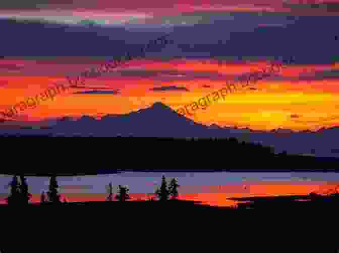 A Breathtaking Sunset In The Alaskan Wilderness, Showcasing A Vibrant Sky Reflected In A Tranquil Lake. Wild Men Wild Alaska: Finding What Lies Beyond The Limits (Wild Men Wild Alaska 1)