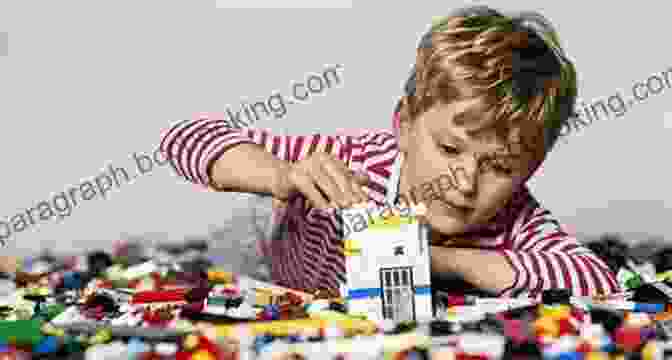 A Child Building A Complex LEGO Model, Showing The Joy And Fulfillment Of Creative Play. The Art Of LEGO Design: Creative Ways To Build Amazing Models