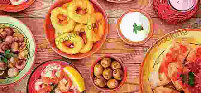 A Vibrant Spread Of Spanish Tapas, Including Croquetas, Patatas Bravas, And Calamares THE A TO Z OF THE RECIPE OF THE SPANISH LANGUAGE