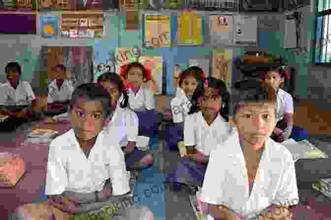 A Young Girl In Rural India Sitting At A Desk In A Classroom, Eagerly Reading A Book. It Takes A School: The Extraordinary Success Story That Is Changing A Nation